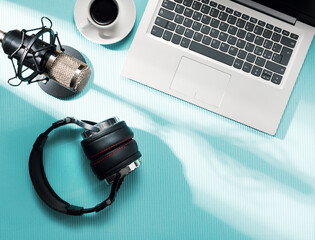 Content creator desk with laptop and audio equipment
