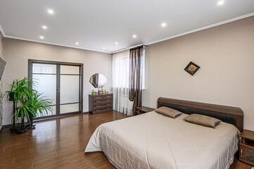 interior room apartment bedroom with bed, cozy place to sleep and relax