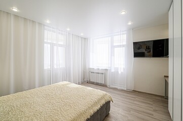 interior room apartment bedroom with bed, cozy place to sleep and relax