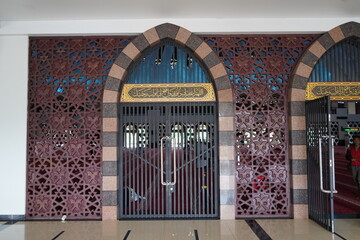 Padang, Indonesia - September 29th 2024 : West door of the Grand Mosque of West Sumatra, Indonesia,...