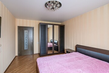 interior room apartment bedroom with bed, cozy place to sleep and relax