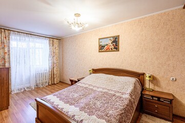 interior room apartment bedroom with bed, cozy place to sleep and relax