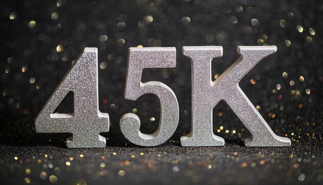 45k followers celebration. Silver text. Social media achievement. Black glittering backdrop.