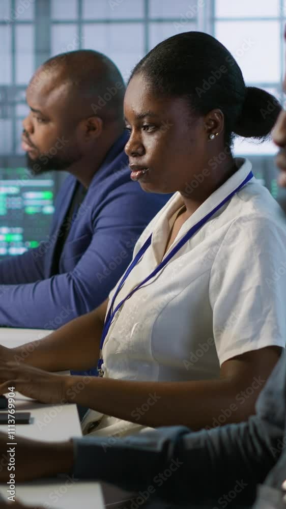 Poster vertical video technicians using computers and tablet in data center, implementing ai systems. serve
