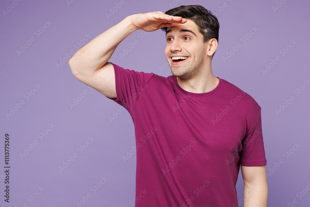 Poster Young satisfied positive Caucasian man he wears violet t-shirt casual clothes hold hand at forehead look far away distance isolated on plain pastel light purple background studio. Lifestyle concept.