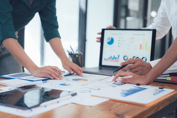 Strategic Collaboration: Business Team Analyzing Data