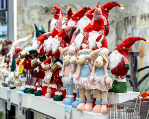 Soft Christmas toys - gnomes and reindeer on the store shelf