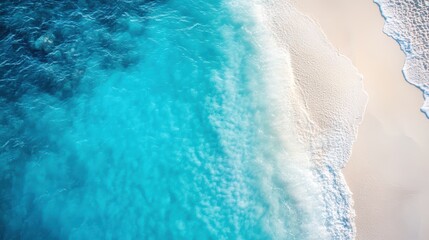 Serene Aerial View of Turquoise Ocean Meeting Sandy Beach Shore