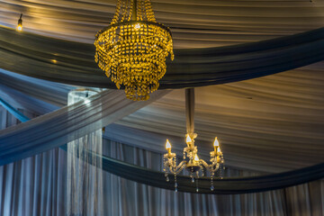 chandelier with crystal glass, Beautiful wedding chandelier decoration on the wedding day, beautiful luxury chandelier in the restaurant, beautiful wedding decoration in the interior.