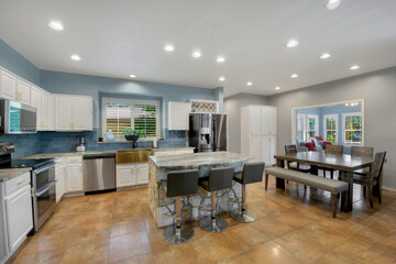 Spacious modern kitchen with a cozy dining area for family time