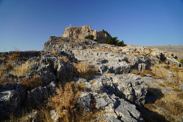 acropolis of Lindos and rocky cliffs