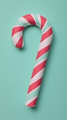 Obraz premium Modern Stylized Candy Cane in Red and Mint Green Against Teal Background