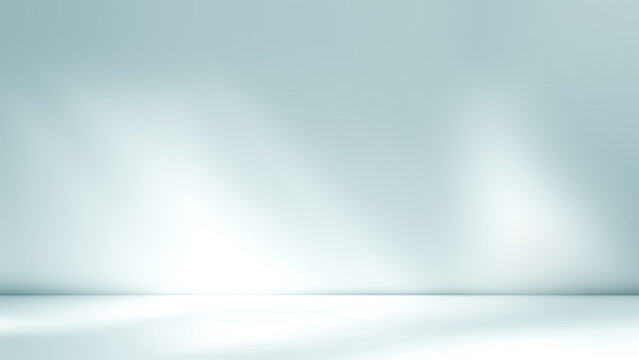 Shadow and light from windows on plaster wall. Minimal abstract light blue background for product presentation.