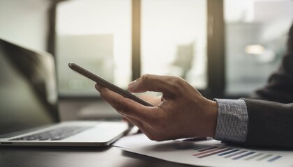 The businessman appears focused and engaged.  