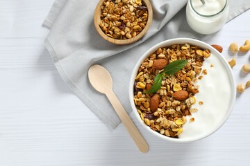 Delicious granola with yogurt on the table