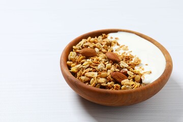 Delicious granola with yogurt on the table
