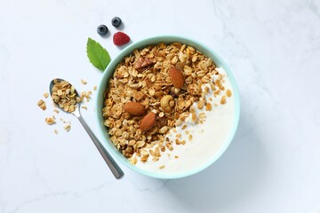 Delicious granola with yogurt on the table