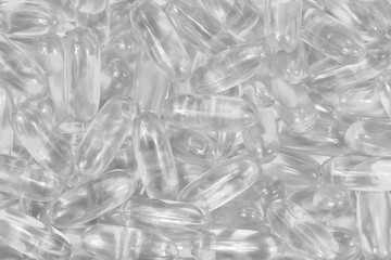 Transparent white pills background texture. colorless tablets