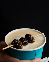 aromatic latte with pine cones