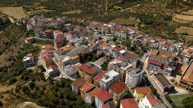 Aerial view of houses, apartments and buildings of the town of Cagnano Varano located in the province of Foggia, in Gargano, Puglia, Italy. 