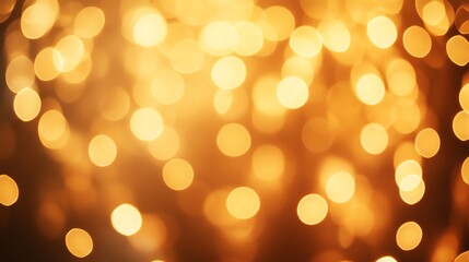 Fototapeta premium A blurred background of out-of-focus, golden lights.