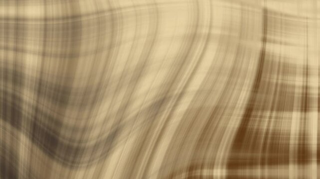 Blurred beige and brown plaid fabric texture ideal for background designs, fashion graphics, textile patterns, and interior decor concepts.