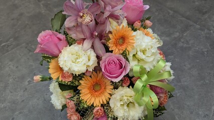bouquet with pink, white and orange flowers