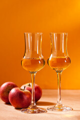 Two glasses of Calvados Brandy and apples