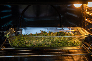 decarboxylation of marijuana in oven. Baking cannabis buds to activate psychoactive effect and cook...