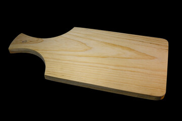 Cutting board placed on a black background