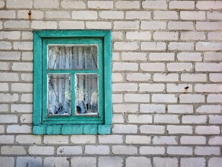 White Brick Wall With An Old Window