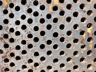 Metal plate with dots