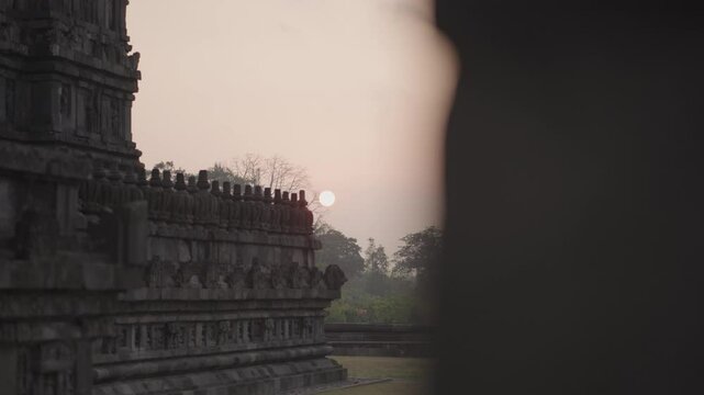 Yogyakarta, Indonesia - Prambanan also called Candi Roro Jonggrang on Morning Sunrise, a 9th century temple dedicated to the Hindu Trimurti, the trinity of Brahma, Vishnu and Shiva