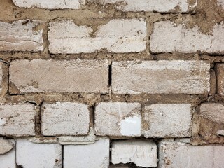 Wall Of White Bricks And Cement Outside