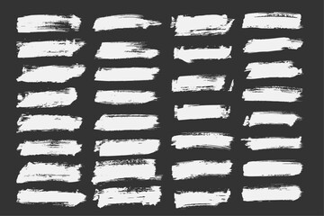 Collection of ink brush strokes. Set of vector grunge brushes featuring dirty textures for banners, boxes, frames, and design elements. Painted objects isolated on a white background