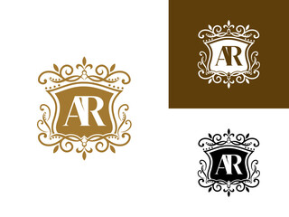 Beautiful luxury letter AR in shield and Abstract Plant. Initial Identity Letter in Gold color Logo vector template