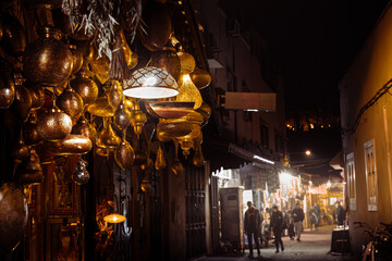 Obraz premium light souks in marrakech in the squares of jema al fina