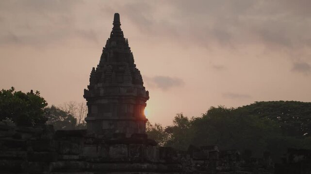 Yogyakarta, Indonesia - Prambanan also called Candi Roro Jonggrang on Morning Sunrise, a 9th century temple dedicated to the Hindu Trimurti, the trinity of Brahma, Vishnu and Shiva