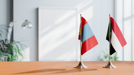 FLAGS OF MONGOLIA AND SUDAN ON TABLE