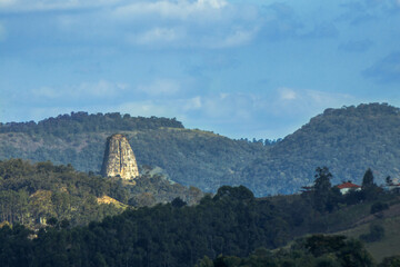 Stone Tower (torre de pedra) Sao Paulo  Majestic Rock Formation Surrounded by Vibrant Forest and Blue Sky in Brazil Iconic Natural Landmark and Tourist Attraction Landscape