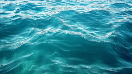 Fototapeta premium Ocean Surface with Ripples and Sunlight Reflections
