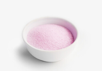 powder pink matcha tea in a white bowl