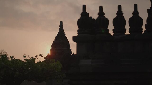Yogyakarta, Indonesia - Prambanan also called Candi Roro Jonggrang on Morning Sunrise, a 9th century temple dedicated to the Hindu Trimurti, the trinity of Brahma, Vishnu and Shiva