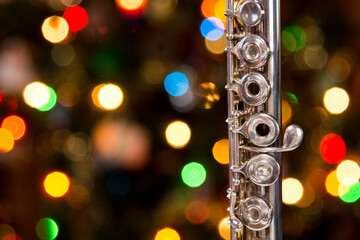a flute with a christmas tree in the background © Blessings Captured