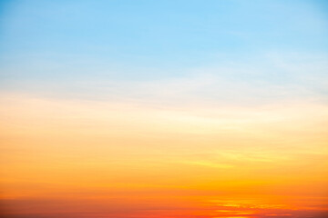 Fototapeta premium Sky, Sunset, Sunrise, like a bright golden and blue sky. The sunrise is decorated with clouds in various shapes, everning,Twilight, Large size, High definition landscape photo