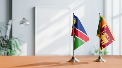 FLAGS OF NAMIBIA AND SRI LANKA ON TABLE
