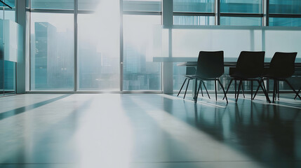 Fototapeta premium Sunlit modern office interior with empty chairs near large windows overlooking city skyline. Ideal for themes of business, success, and corporate growth.