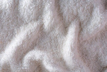 white plush fabric texture background , background pattern of soft warm material