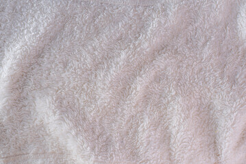 close-up of wool with a fluffy texture, the focus is on the intricate fibers, highlighting its warmth and comfort