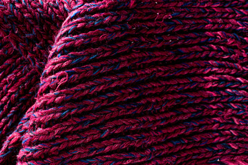 Winter wool hand-knit beige sweater. Clothes textile background